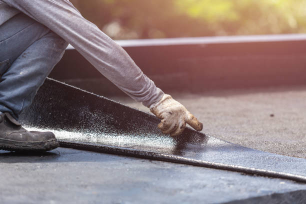 Professional Basement Waterproofing technician working in Partridge, KS